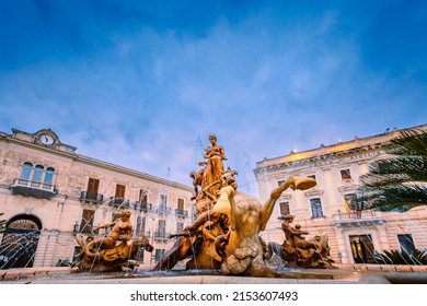 Siracusa, Italy - March 2022: Low angle view of fountain of Diana in the historical center of Ortigia