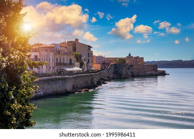 Siracusa, Ortigia Island, Sicily, Italy. Isola di Ortigia, coast of Ortigia island at city of Syracuse, Sicily, Italy. Coastline town Syracuse, Sicily and old Ortigia island.