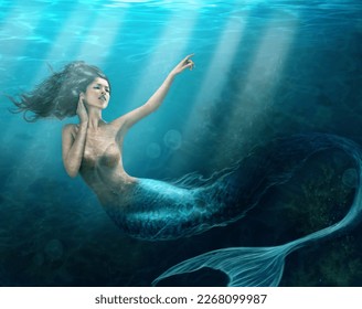 Siren of the sea. Shot of a mermaid swimming in solitude in the deep blue sea - ALL design on this image is created from scratch by Yuri Arcurs team of professionals for this particular photo shoot. - Shutterstock ID 2268099987