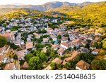 Sirince is a neighbourhood in Selcuk, Izmir Province, Turkey. Aerial drone view of ancient village Sirince. Beautiful landscape of Sirince with traditional historical houses.
