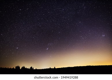 Sirius, Orion Constellation, Mars  and Pleiades in the night sky.