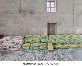 Sirohi Road, India - July 21 2020: Mineral Powder Stored In Misprint Cement Bags At Factory Warehouse