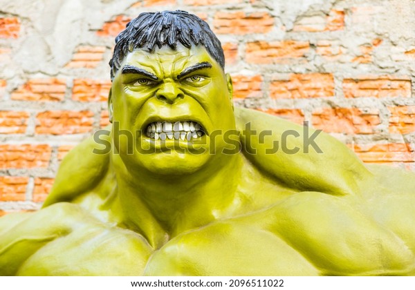 SISAKET, THAILAND – December 9, 2021: Hulk model through a brick wall at Coffeeshop display in Sisaket Province, Thailand