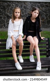 sisterhood. two sisters or friends spending time outdoors on sunny summer day. bff, sibling, girlfriend. millennial teen. - Shutterstock ID 2149804549