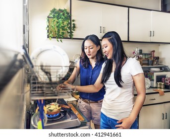 Sisters Happiness Cooking Activity Concept - Shutterstock ID 412941661