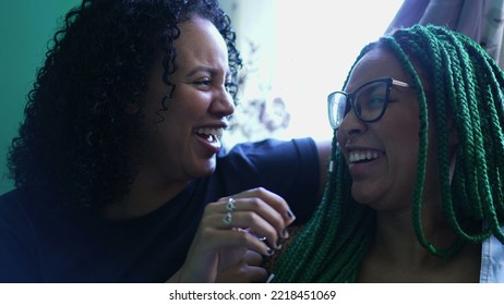 Sisters Laughing And Smiling. Two Hispanic Black Girlfriends Real Life Laugh And Smile