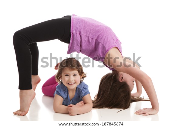 Sisters Older Sister Performing Back Bend Stock Photo (Edit Now) 187845674