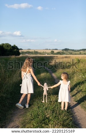 Similar – Attractive smiling blond woman with her two dogs