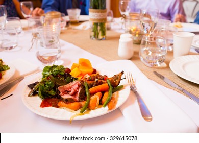 A Sit Down Dinner For A Wedding Reception Meal At A Table.