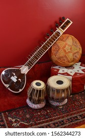 Sitar And Tabla In Red Room