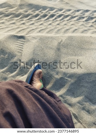 Sitdown on the sand photo