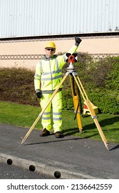 Site Engineer Set Prism Above Control Point And Giving Ok Sign