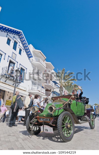 SITGES, SPAIN - MARCH\
11: Daniel Cazals drives a 1912 Renault on the second phase of the\
\