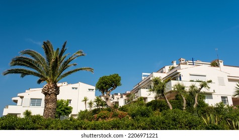 Sitges Town In Catalonia. White Houses And Blue Sky. Summer Travel Concept, Copy Space