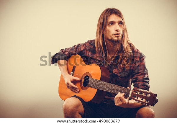 Sitting Long Haired Bearded Man Playing Stock Photo Edit Now