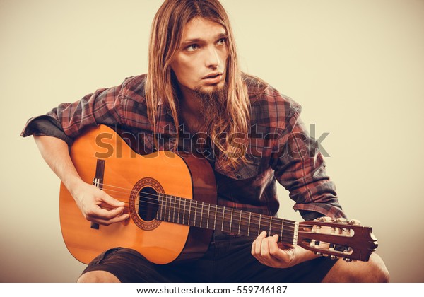 Sitting Long Haired Bearded Man Playing Stock Photo Edit Now