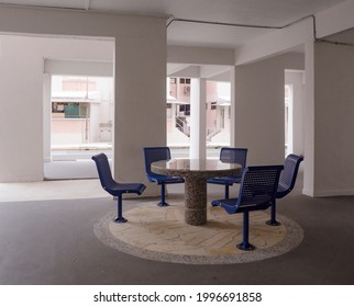 Sitting And Recreational Area Under A HDB Void Deck In A Housing Estate In Singapore