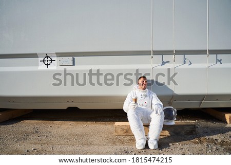Sitting rocketman drinking fresh coffee