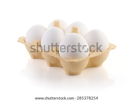Six Eggs in carton on white with clipping path