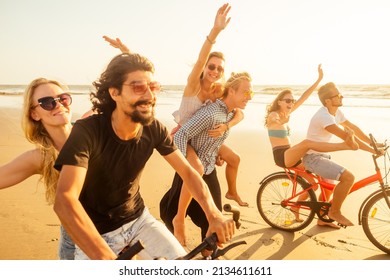six friends meeting on the beach in Goa India and having time together