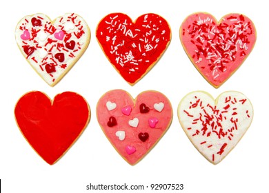 Six individual heart-shaped cookies for Valentines Day over white - Powered by Shutterstock