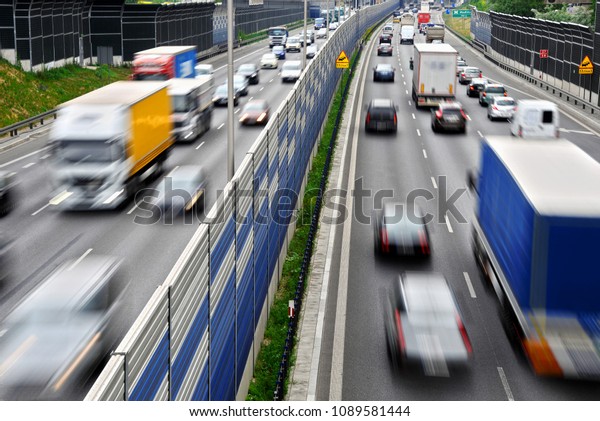 Six lane controlled-access highway in Warsaw,\
Poland during rush hour\
\
