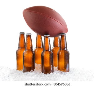 Six Pack Of Bottled Beer Holding Up American Football Isolated On White Background