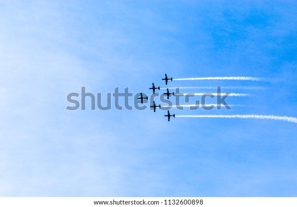 Six\
planes are flying in the air. Abstract\
background.