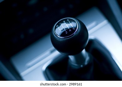 Six Speed Gear Shifter In Sports Car. Manual Transmission Detail.