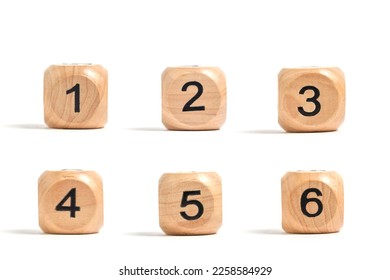 Six wooden cubes with numbers for board games white background - Shutterstock ID 2258584929