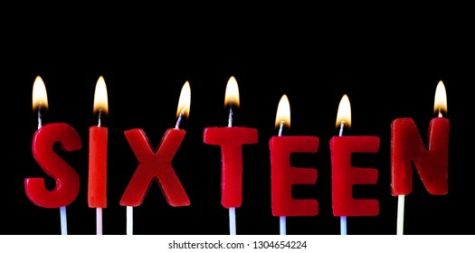 Sixteen Spellt Out In Red Birthday Candles Against A Black Background