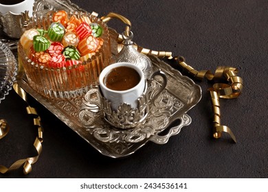 A sixteenth-century flavor Traditional Turkish Hard Colorful Candy is Akide in glass bowl with Turkish Coffee