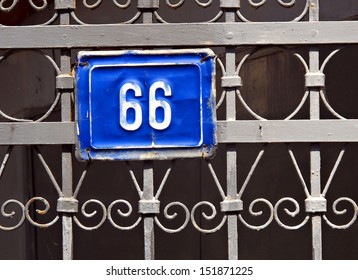 Sixty-six house address plate number - Shutterstock ID 151871225