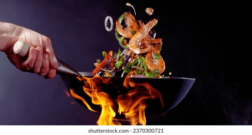 Sizzling Food in a Frying Pan, 
					Cooking Delicious Meal in a Skillet, 
					Chef's Frying Pan with Tasty Dish, 
					Culinary Art: Pan-Frying Perfection, 
					Kitchen Cooking: Frying Pan on Stove