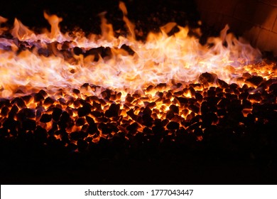 Sizzling Peat Fire In A Distillery