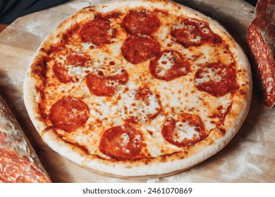 Sizzling Pepperoni Perfection,A mouthwatering pepperoni pizza sits on a rustic wooden cutting board, - Powered by Shutterstock