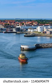 Skagen, Denmark - June 03 2018: A Small Boat Sails Out Of Skagen Harbour On A Sunny Summer Day