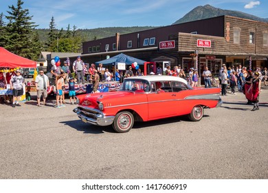 Skagway, Alaska / United States - July 4 2018: Fourth Of July Parade With Antique Chevrolet Car Passing The Reviewing Stand