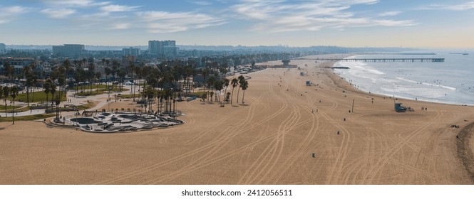 Skate board park in Venice beach with people skating by the Pacific ocean. Best and most popular skate park in the world. - Powered by Shutterstock