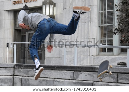 Skate boarder missing a trick