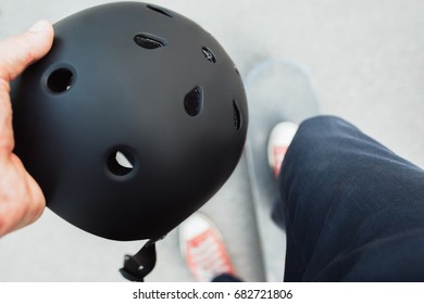 Skateboard halmet and safety acessrise. Head care protection from injoury. Extreme sport background. Headwear stuff for skater - Shutterstock ID 682721806