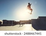 Skateboard, man and jump in skate park with extreme sport and training in Los Angeles with mockup. Sunshine, deck and skater in the city with balance, skating competition and fun board flip by ramp