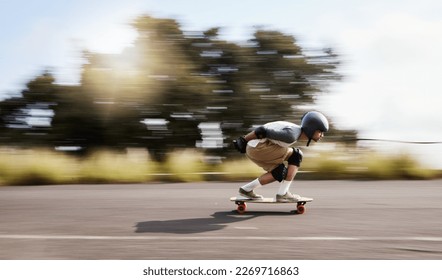 Skateboard, motion blur and mountain with man in road for speed, freedom and summer break. Sports, adventure and wellness with guy skating fast in street for training, gen z and balance in nature