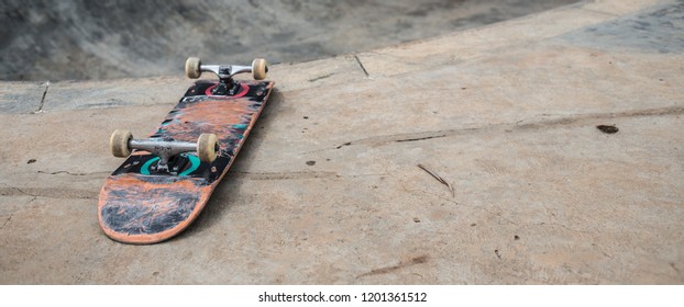 Skateboard On The Ground In A Skatepark