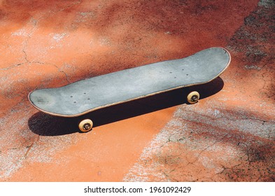 Skateboard On An Old Tennis Court, Skating Concept Copy Space