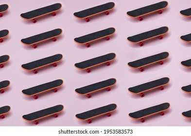 Skateboard On A Pink Background. Pattern.