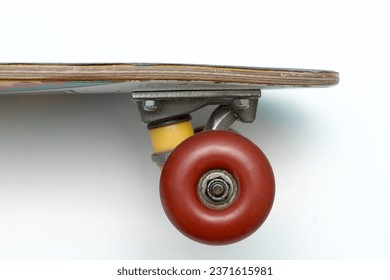 Skateboard. Penny board. Small cruiser board. Wooden board. Vintage skateboard concept. Used penny board close up view on white background.  - Powered by Shutterstock