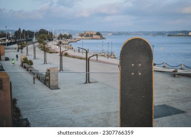 skateboard with sunset boardwalk background - Powered by Shutterstock