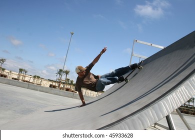 Skateboarder In Action On A Ramp