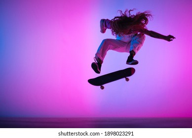 Skateboarder Doing A Big Kick Flip